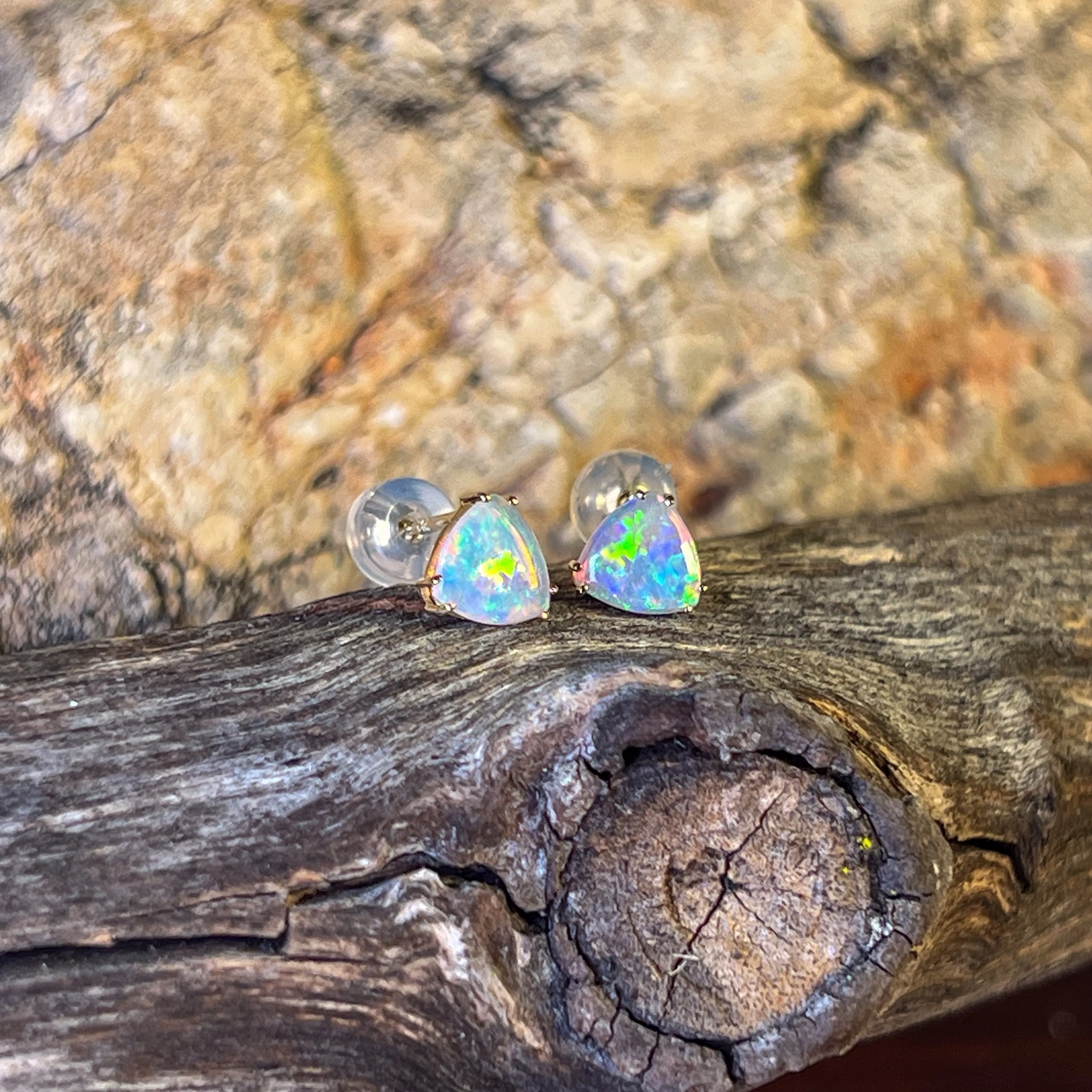 14kt Yellow Gold pair of Trillion cut Crystal Opals 0.83ct studs
