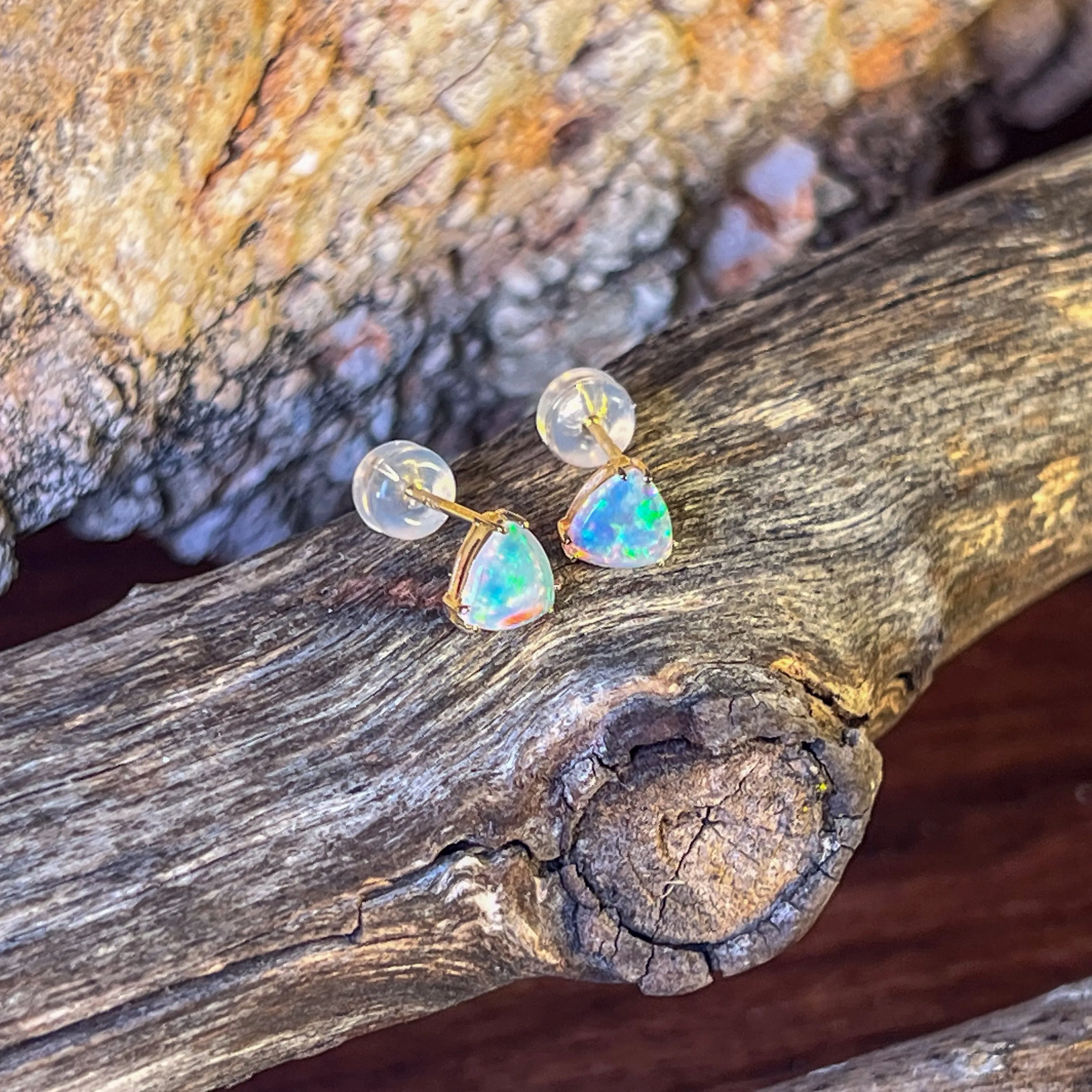 14kt Yellow Gold pair of Trillion cut Crystal Opals 0.83ct studs