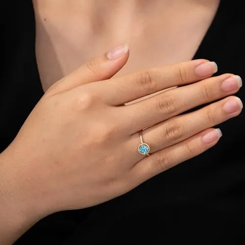 Amazon Essentials 10k Gold Imported Infinite Elements Crystal February Birthstone Ring, Size 7 (previously Amazon Collection)
